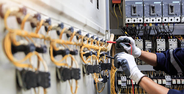 Professional Electrician technician working in Tiffin, IA